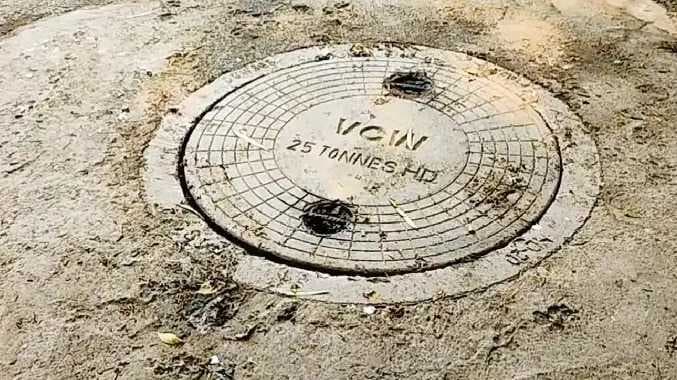 CHN Baby in drainage
